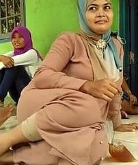 Beautiful Indonesian jocular mater at hand hijab